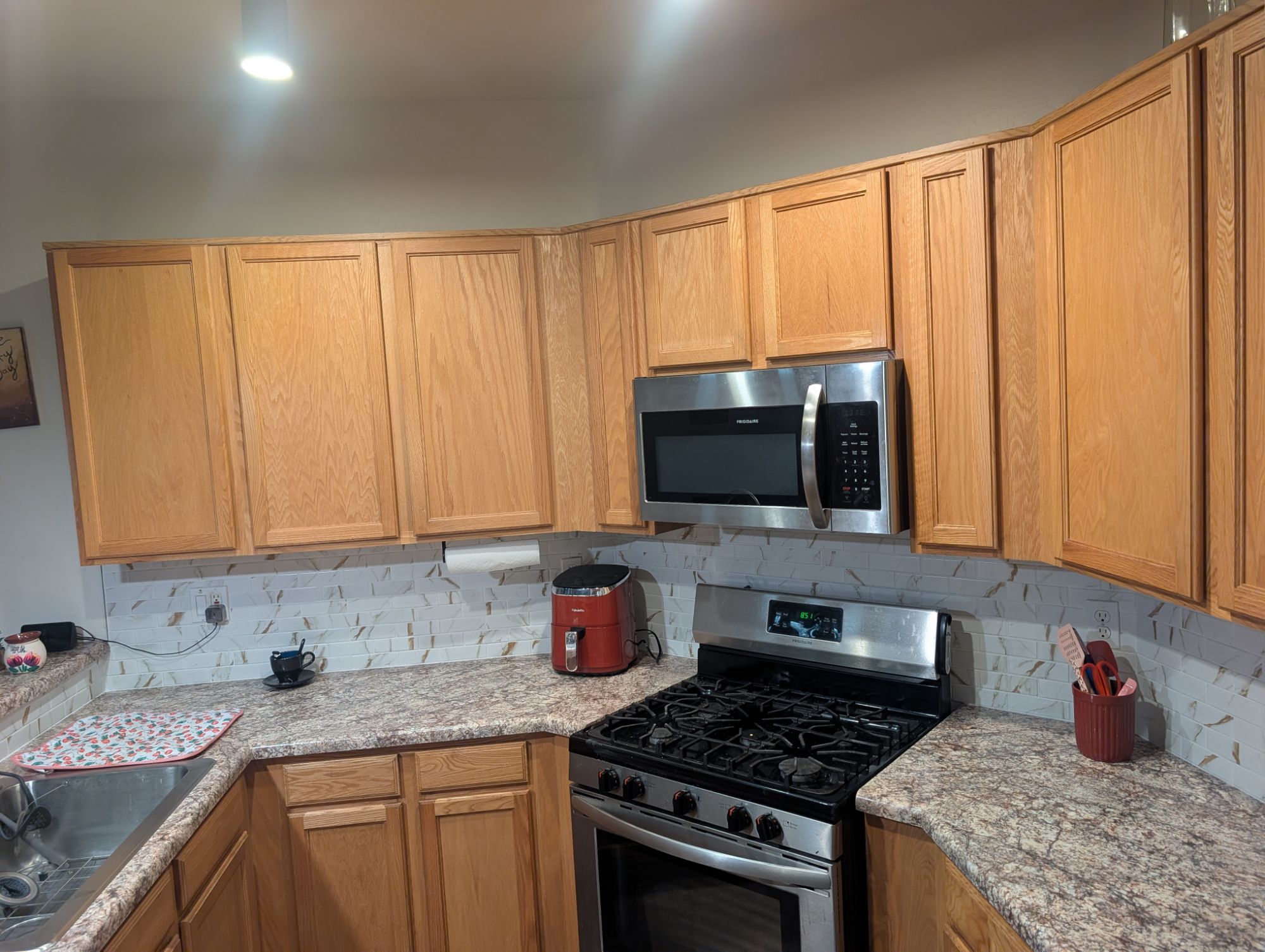 Kitchen cabinets and built-in microwave